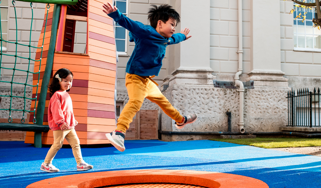 Kids at The Cove Playground in Greenwich